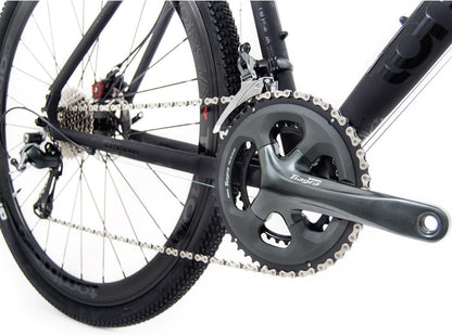 Illimitate Gravel Bike, Shimano Tiagra with Disc Brakes, Extra Wide Tires and Carbon Fork, Perfect for Road or Dirt Trail Adventure Touring, Matte
